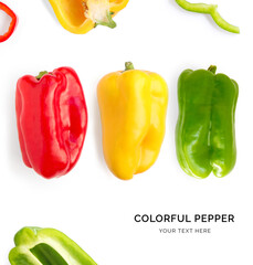 Creative layout made of green, red and yellow pepper. Flat lay. Food concept. Colorful pepper on...