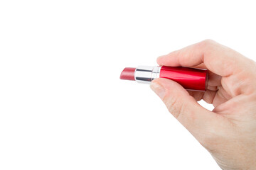 Female hand holding red open lipstick, isolated on white background