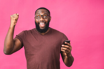Photo of overjoyed black african american man knowing that he became winner of something so...
