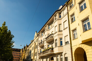 Fototapeta na wymiar beautiful old buildings in the city of Munich, renovated old buildings, apartments, condominiums