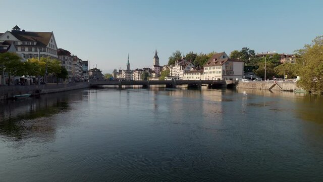 Zurich switzerland: september, 14. 2021 autumn morning, view of the Rudolf brun bridge with swiss heimatwerk buildings in the background sankt peter and fraum&uuml;nster church