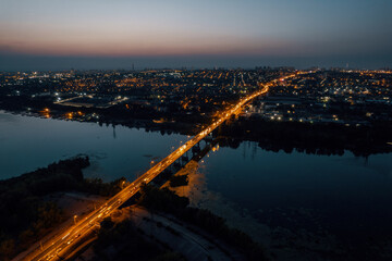 Fototapeta na wymiar Old bridge city river near city at night