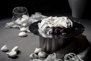 Homemade meringue base for Pavlova cake on black concrete texture background. Copy space.
 - obrazy, fototapety, plakaty