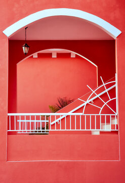 Red wall with big open windows
