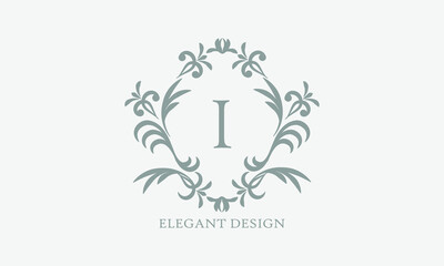 Exquisite design of an elegant monogram with the letter I in the center in gray. Logo for boutiques, cafes, bars, restaurants, invitations. Business style and brand of the company