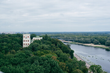 Fototapeta na wymiar The River Bridge over the Sozh River leading to the clock tower