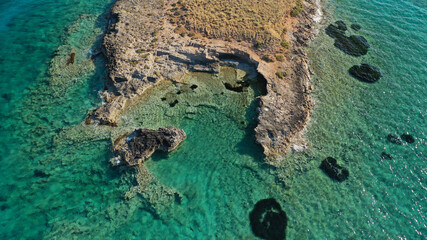 Fototapeta na wymiar Aerial drone photo of prehistoric settlement of Pavlopetri a sunken city and archaeological site just below surface near popular Pounta beach and Elafonisos island, Peloponnese, Greece