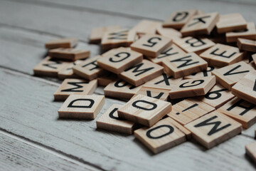 Word letters arranged on a wooden background