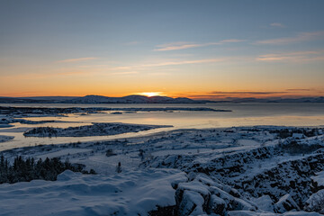 Fototapeta na wymiar Thingvellir National Park in Iceland at sunrise in winter