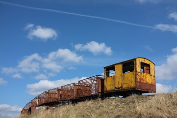 old rusted sky train used to carry turf in ireland