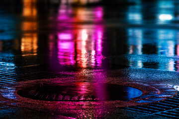 Lights and shadows rain night, autumn city. Neon street illumination after night rain. Night...