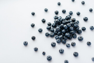 A bunch of ripe, beautiful blueberries, blueberries close-up on a white background. Healthy food, and vitamins.