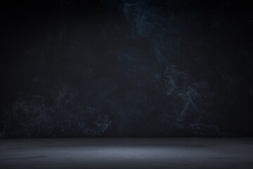 Dark background with concrete floor and smoke on it