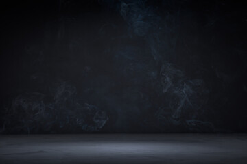 Dark background with concrete floor and smoke on it