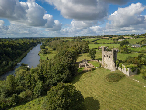 Dunmoe castle aerial view with swans on river Boyne in the foreground. Navan, Co. Meath, Ireland. September 19, 2021