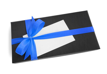 Black gift box (present) with blue satin ribbon bow and a blank card with copy space, isolated on white background
