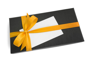 Black gift box (present) with yellow satin ribbon bow and a blank card with copy space, isolated on...