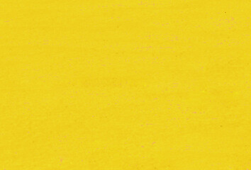Rough lemon yellow plaster surface.