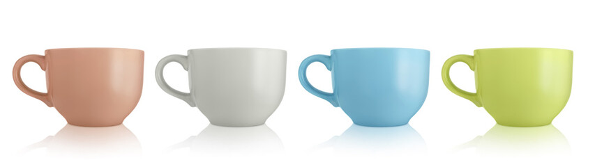 Ceramic cups. Four large empty ceramic mug isolated on white background. Mugs with a handle. Green, gray, brown and blue cups.