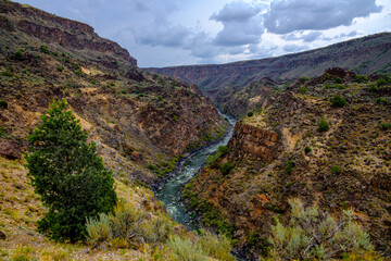 Fototapeta na wymiar Sweeping view of the Rio Grande Gorge as a storm rises