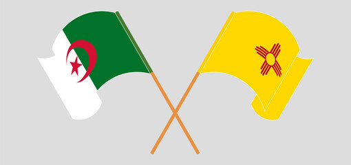 Crossed and waving flags of Algeria and the State of New Mexico