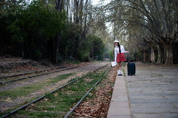 Girl waiting at train station