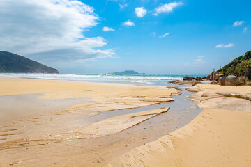 nuvens de chuva e a areia branca da  Praia Brava Florianopolis Santa Catarina Brasil Florianópolis