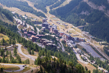 Overview of mountain resort village Isola 2000 in the french alps during summer with the Col de...