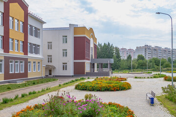 Fototapeta na wymiar The building of a modern school in Russia, a new building for teaching children