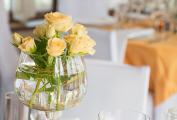 Bouquet of white roses at the celebration