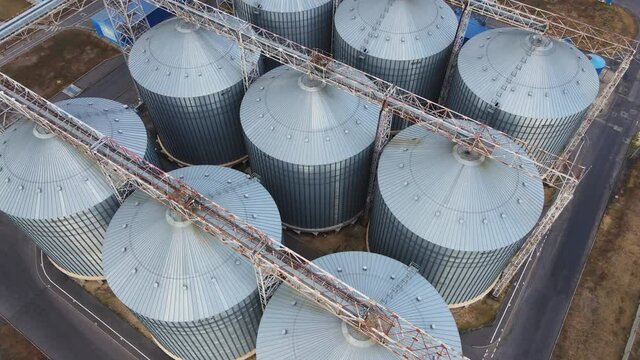 Grain storage in large silos aerial view. Silo with grain. Grain storage tank view from above