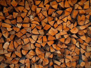 Firewood texture. Pile of dry chopped fire wood background