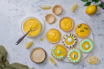 Traditional french lemon tart on wooden board