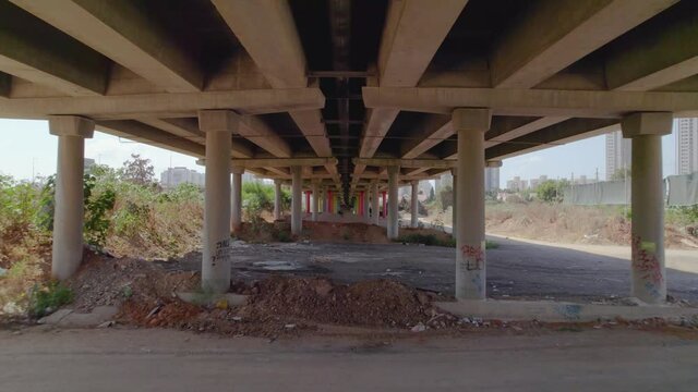 Drone shot under the bridge overpass in industrial area