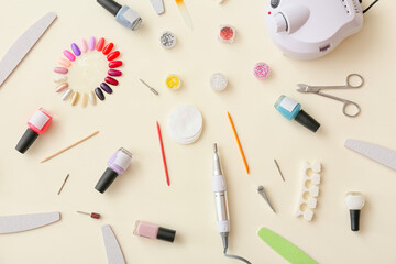 Fototapeta na wymiar Set of tools for manicure on color background