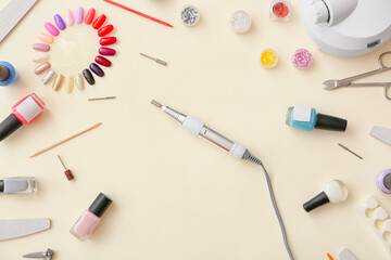 Set of tools for manicure on color background