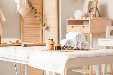 Spa supplies on table in beauty salon