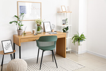 Interior of stylish room with modern workplace