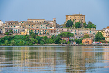 Fototapeta na wymiar View of the village of Capodimonte on the Bolsena Lake