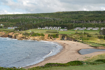 A beach on the ocean during the day