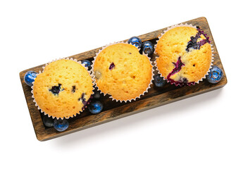 Tray with tasty blueberry muffins on white background
