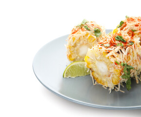 Plate with tasty Elote Mexican Street Corn on white background, closeup