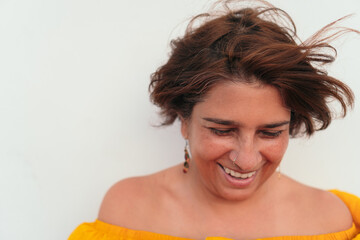 Obraz premium Mature woman smiling with white background.