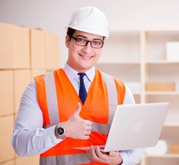 Man working in postal parcel delivery service office