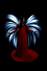 Model in Studio Light Painted on Black Background