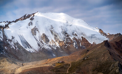 View with snow-capped peaks of mountains.