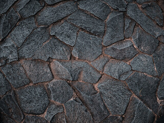 random pattern of gray natural stones in the garden
