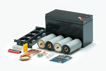 12 Volt, Lithium Iron Phosphate Battery or LiFePO4 Rechargeable DIY kit for EV, eBikes, Outdoor Solar System with isolated on white background with clipping path, Selective focus.
