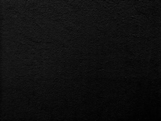 Black color​ paint​ on Cement​ wall​ concrete textured background​ abstract​ material​ rough​ surface