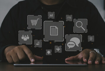 Digital Marketing Concept.Businessman hand working with laptop computer, tablet and smart phone in office with virtual icon diagram.